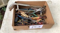 Misc screw drivers, electrical pliers, saw