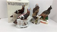 3 decanters: wild Turkey, Eagle, and quail