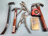Hammers, vice grips, pry bar