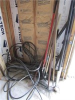 Hose, 3 rakes, shovel, yard tools