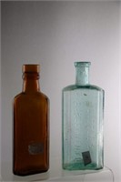 2 Medecine Shaped Bottles