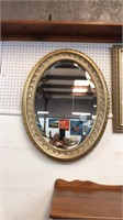 Large oval beveled mirror with frame