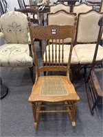 Carved oak rocking chair