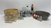 Weaved basket with (6) milk bottles, Mason jars