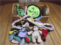 Assorted Dog Toys in Wooden Box
