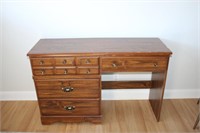 Wood 4 drawer writing desk, damage to top,
