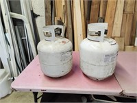 2 - 20lb propane tanks -  both feel full - gas