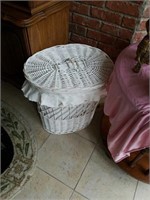 White wicker hamper with 2 large rugs,  2 small