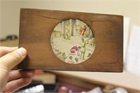 A Wood Framed Glass Slide