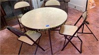 Round card table and chairs with poker table top