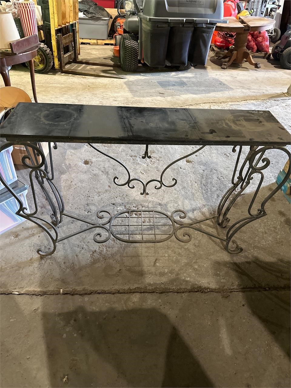 Raw iron table with marble top