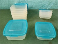 Small plastic containers with attached lids, flip