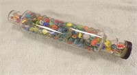 VINTAGE GLASS ROLLING PIN FULL OF MARBLES