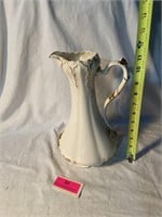 White ceramic with gold pitcher