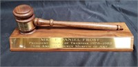 Walnut gavel on stand with engraved plaque