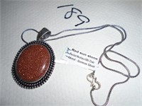 red sun stone pendant w/ chain