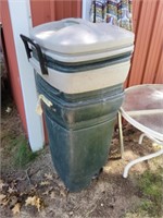 (2) 30 gallon rolling plastic trash cans with