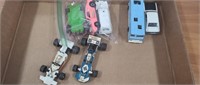 Lot of Race Cars and Other Vehicles