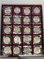 20 - uncirculated Morgan silver dollars in case