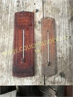 Pair of old advertising thermometers