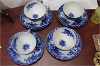 A Burslem Flow Blue Cup and Saucer