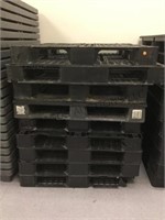 STACK OF PLASTIC PALLETS