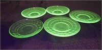 5 Vaseline Glass saucers And Plates