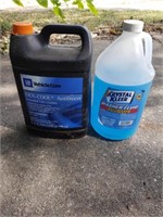 Partial jugs of antifreeze & washer fluid