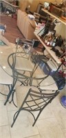 Round glass top table with 4 chairs