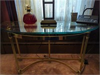 Glass topped heavy metal sofa table