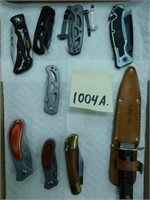 Flat Of 9 Pocket Knives