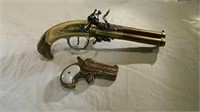 Two commemorative old world pistols