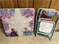 Child’s frozen card table and two chairs