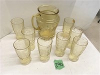 gold depression glass pitcher & glasses