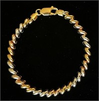 Sterling bracelet w/copper, gold, silver finish