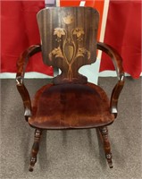 Wood rocking chair with inlaid back