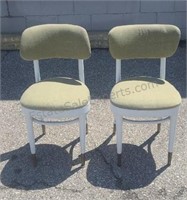 Padded dinner chairs. White with brass foot