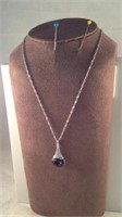 cubic Zirconium with purple gem pendant on a 19