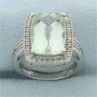 Aquamarine and Diamond Halo Ring in 14k White Gold