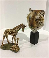 Composite tiger head sculpture and giraffe - tiger