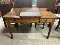 Wooden slant top writing desk, worn. 34in tall.