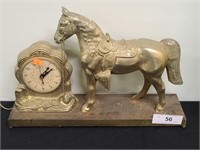 Antique united brass horse clock