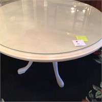 Cream colored wood dining table glass protection