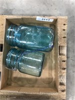 2 blue jars