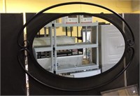 Metal oval framed wall mirror 36 wide by 25 tall