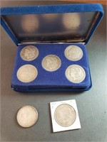 (7) Morgan Dollars