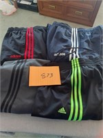 Four pairs of Adidas jogging pants,