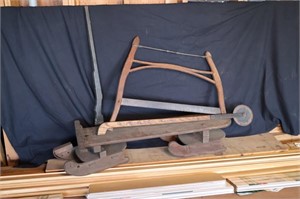 Antique sled, prop rifle, buck saw, edger