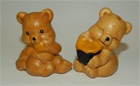 Cute Little Brown Bears Eating Honey