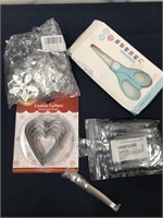 Baby food scissors, sugar tongs, cookie cutters,